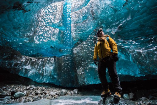 Wednesday 25th November 2015, Vatnajökull national park, Iceland: Photographer Mikael Buck with assistance from renowned local Icelandic guide Einar Runar Sigurdsson, explored the frozen world of Vatnajökull glacier in Iceland using Sonys world first back-illuminated full-frame sensor  which features in the ?7R II camera. His images were taken without use of a tripod or any image stitching techniques in photoshop. This was made possible through Sonys new sensor technology, allowing incredibly detailed low-light hand held photography. Previously images this detailed would have required carrying bulky equipment to the caves, some of which can require hiking and climbing over a glacier for up to two hours to to access. This picture: Guide Helen Maria is pictured inside the waterfall cave PR Handout - editorial usage only. Photographer&#039;s details not to be removed from metadata or byline. For further information please contact Rochelle Collison at Hope & Glory PR on 020 7014 5306 or rochelle.collison@hopeandglorypr.com Copyright: © Mikael Buck / Sony 07828 201 042 / mikaelbuck@gmail.com